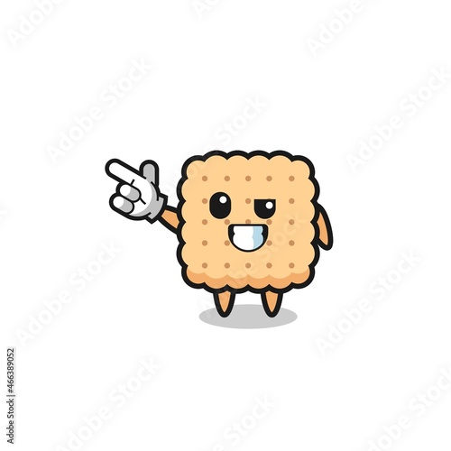 cracker mascot pointing top left