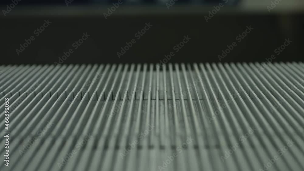 Close up of escalator stairs moving down Close up of escalator stairs moving down