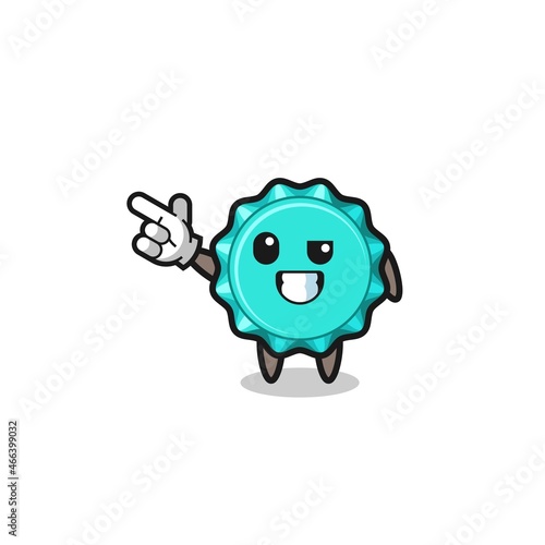 bottle cap mascot pointing top left