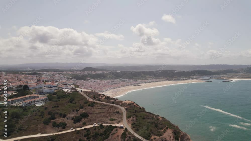 Unique aerial panoramic view of Nazare promontory and beach in background, Portugal Unique aerial panoramic view of Nazare promontory and beach in background, Portugal