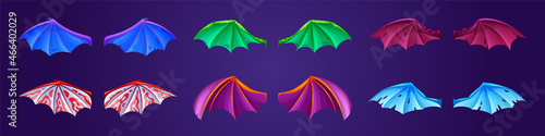 Dragon wings different colors isolated on background. Vector cartoon set of cute leather wings of bat, fantasy animal or monster, fairy tale flying creature, devil or vampire