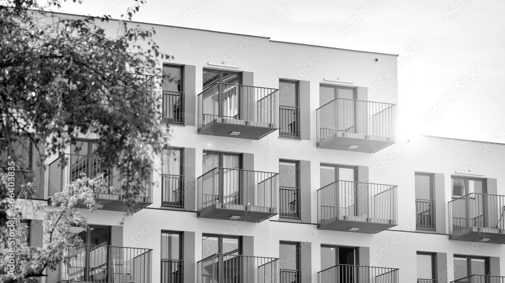 Modern apartment building. Modern urban architecture and details of building facade. Black and white. Modern apartment building. Modern urban architecture and details of building facade. Black and white.