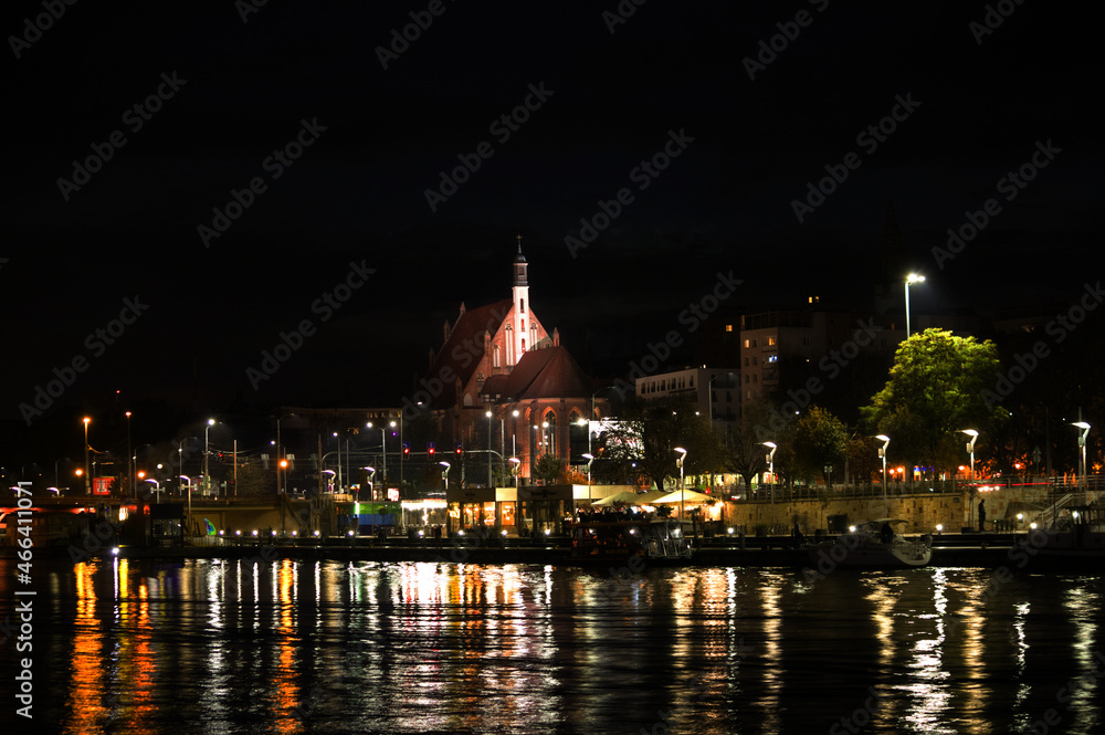  the historic parish of St. John the Evangelist seen at night, Szczecin, Poland