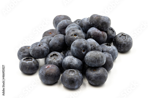 Blueberries on a white background. In combination with the shade of ripe blueberries. close up