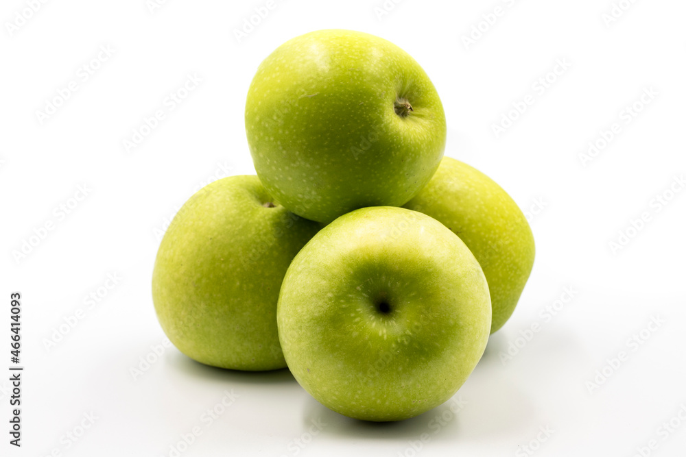 Sour apples on a white background. Ripe Green combined with a shade of sour apple. close up Sour apples on a white background. Ripe Green combined with a shade of sour apple. close up