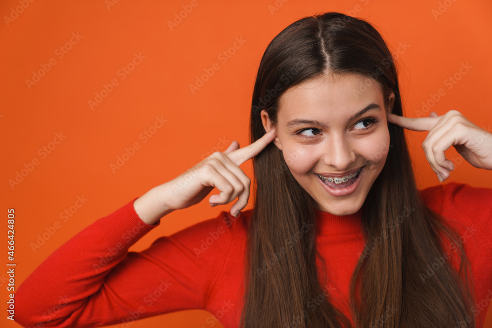 custom made wallpaper toronto digitalYoung white brunette woman laughing and plugging her ears