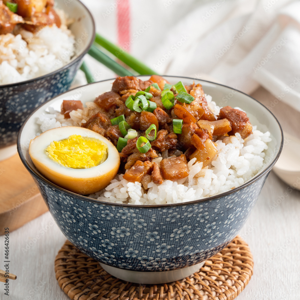 Braised meat over cooked rice, famous and delicious street food in Taiwan. Braised meat over cooked rice, famous and delicious street food in Taiwan.