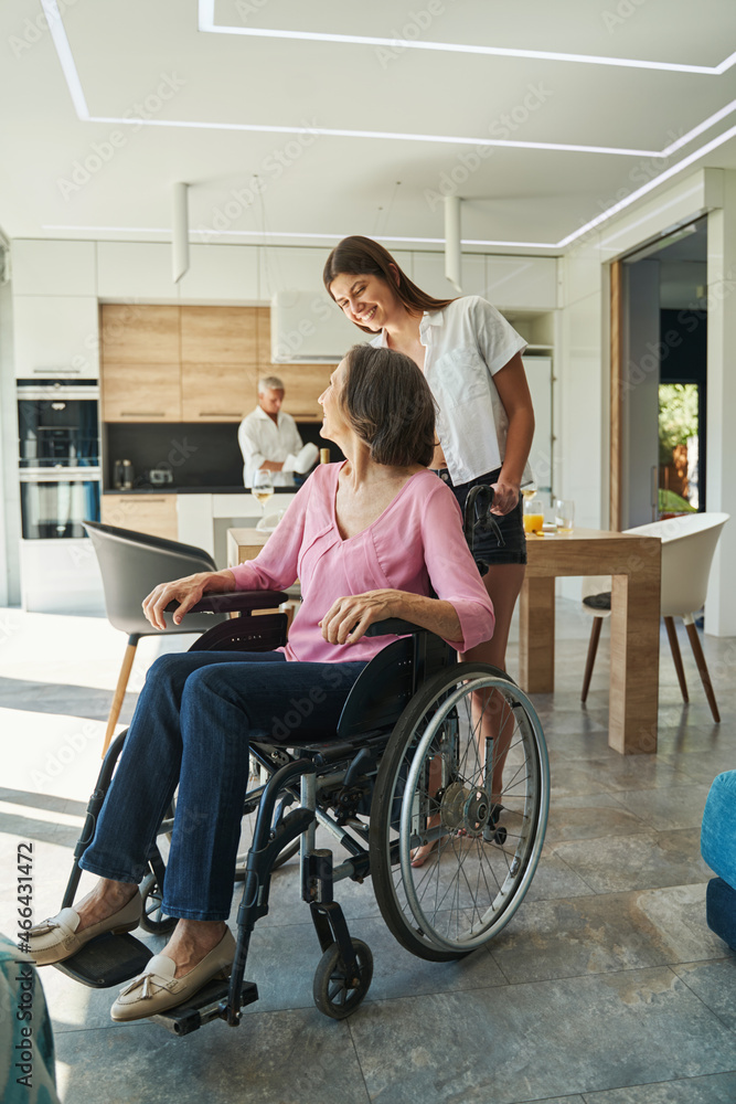 Relatives spending time together and talking at home