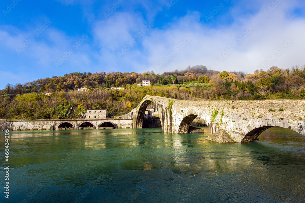 Naklejka premium The bridge crosses the Serchio River.