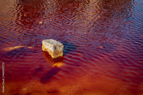Puddle of red water in the mines of Mazarron. photo