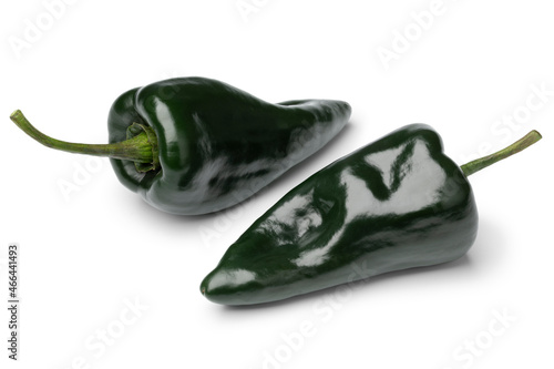 Pair of fresh green Mexican Poblano Pepper close up isolated on white background   photo