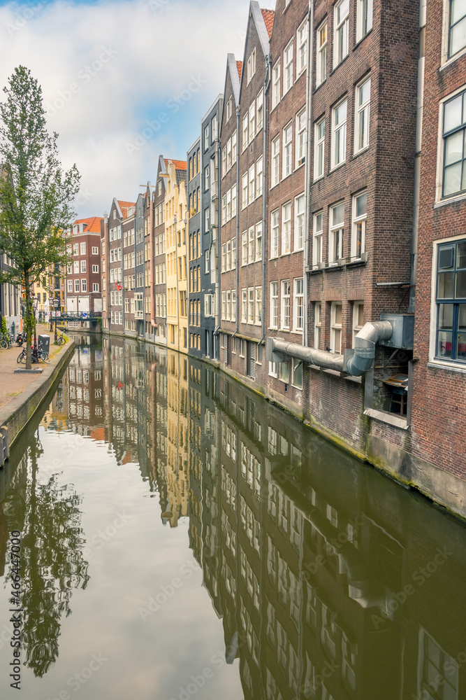 Houses on the Canal of Amsterdam in an Industrial Area