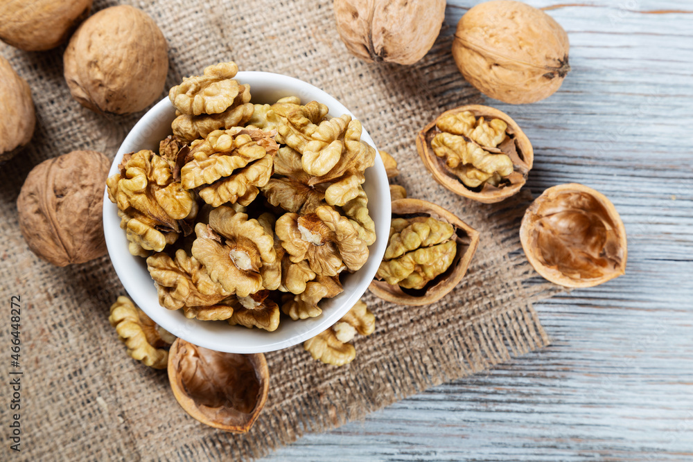 Purified walnuts in a white bowl Purified walnuts in a white bowl