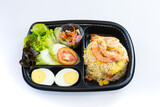 Thai food lunch box in plastic packages, Authentic Thai Fried Rice With Shrimp.