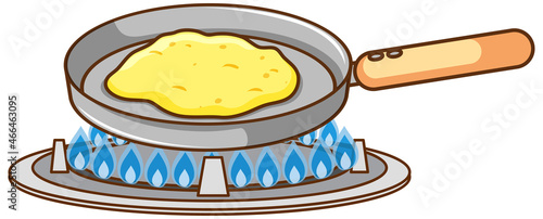 Omelette in frying pan on gas stove