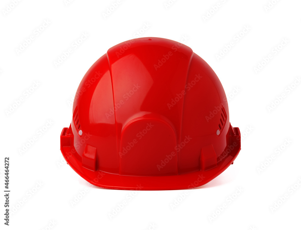 Fototapeta premium Red plastic safety hardhat isolated on white background
