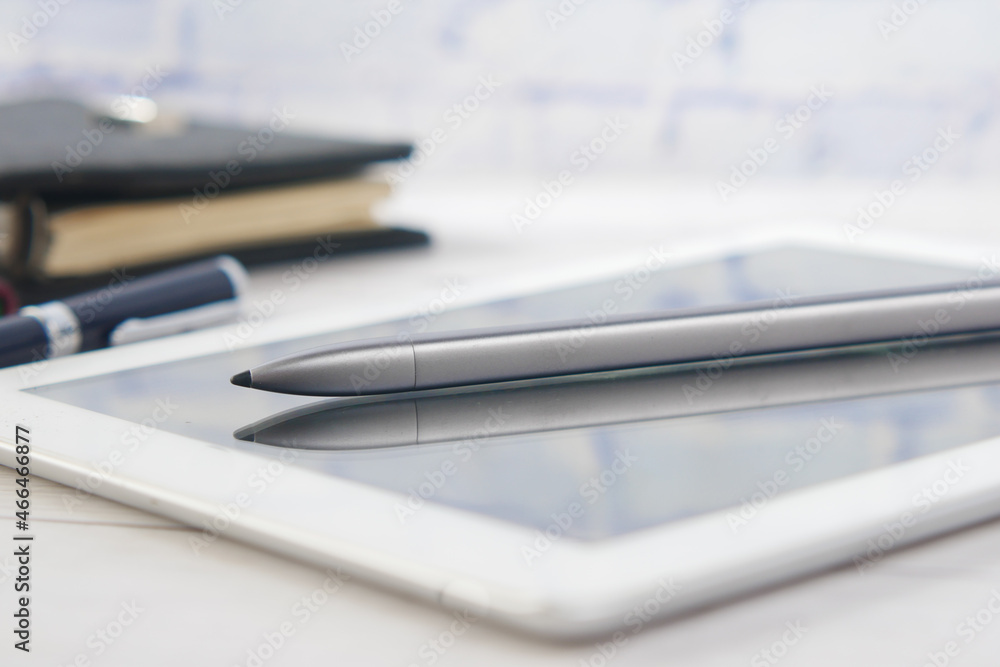 digital tablet with graphic pen on table digital tablet with graphic pen on table