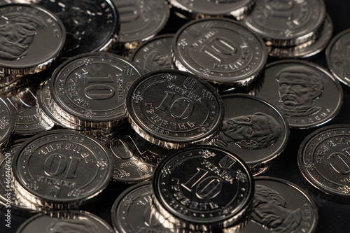 Ukrainian hryvnias coins. Background from Ukrainian coins 10 hryvnia. Money and finances.