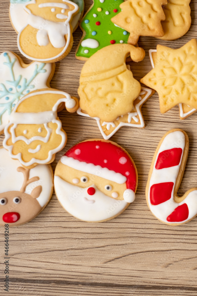 Merry Christmas with homemade cookies on wood table background. Xmas, party, holiday and happy New Year concept Merry Christmas with homemade cookies on wood table background. Xmas, party, holiday and happy New Year concept