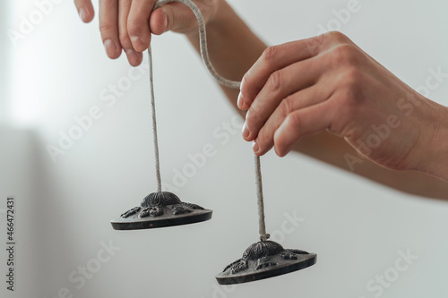 hands holding a bells 