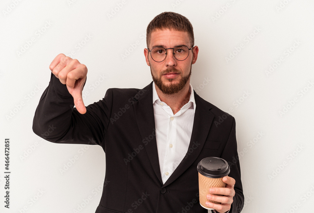 Young business caucasian man holding take away coffee isolated on white background showing a dislike gesture, thumbs down. Disagreement concept. Young business caucasian man holding take away coffee isolated on white background showing a dislike gesture, thumbs down. Disagreement concept.