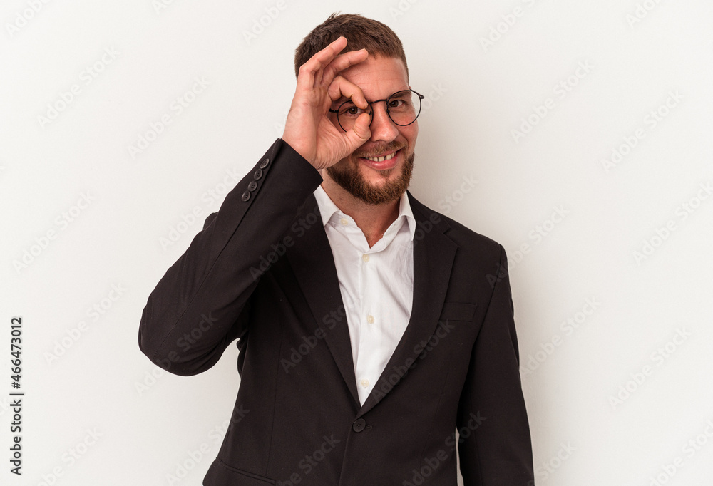 Young business caucasian man isolated on white background excited keeping ok gesture on eye. Young business caucasian man isolated on white background excited keeping ok gesture on eye.
