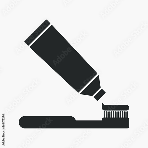 Toothbrush and toothpaste vector icon isolated on white background. Dental hygiene sign.