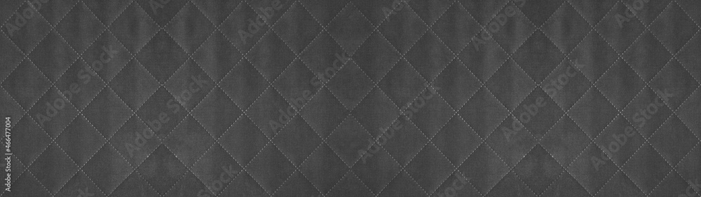 Fototapeta premium Gray grey colored seamless natural cotton linen textile fabric texture pattern, with diamond quilted, rhombic stiching. stitched background banner panorama