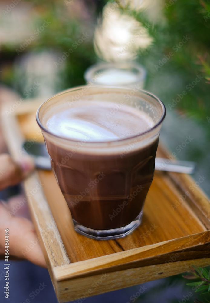 Hot coffee, hot milk coffee, in the light of the sun Hot coffee, hot milk coffee, in the light of the sun