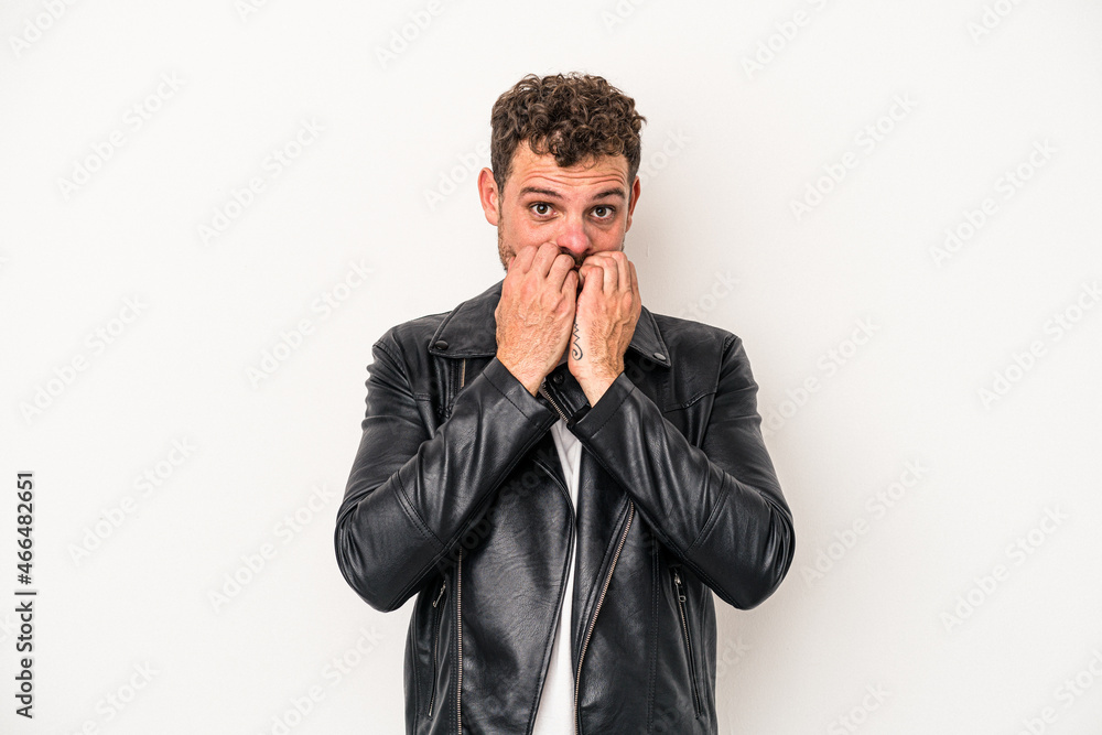 Young caucasian man isolated on white background biting fingernails, nervous and very anxious. Young caucasian man isolated on white background biting fingernails, nervous and very anxious.