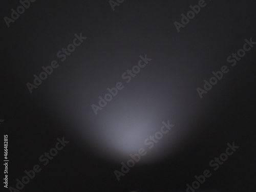 Background image is grayish black, blurry, soft.