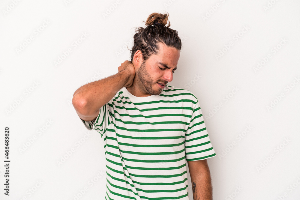 Young caucasian man isolated on white background suffering neck pain due to sedentary lifestyle. Young caucasian man isolated on white background suffering neck pain due to sedentary lifestyle.