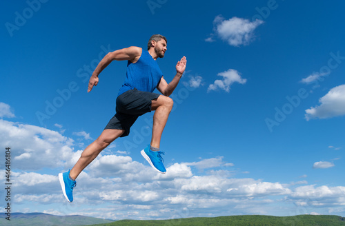 workout activity. healthy man jumping. fitness guy in sportswear. full of energy.