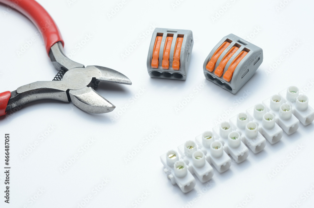 tools for electro repair on a light background. close-up. tools for electro repair on a light background. close-up.