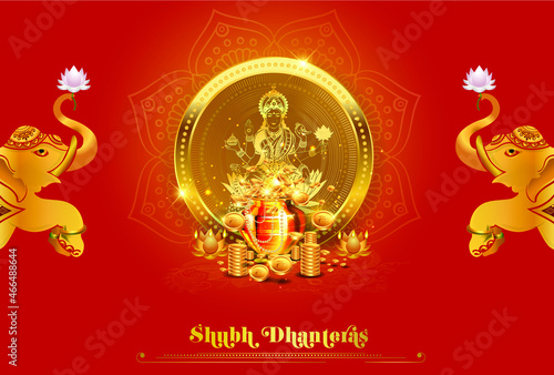 Indian festival Dhanteras puja worship of Goddess Lakshmi Laxmi and god dhanvantri golden coin and vintage background photo