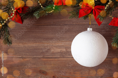 Bild auf Leinwand Christmas santas cam white ball with Christmas decorations and bokeh on wooden b