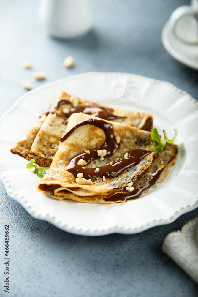 Homemade crepes with chocolate sauce Homemade crepes with chocolate sauce