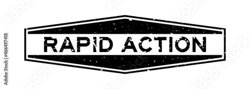 Grunge black rapid action word hexagon rubber seal stamp on white background