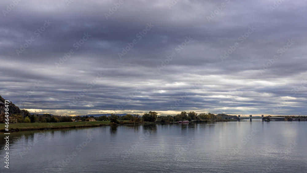 View of the Rhône River with a cloudy sky, Donzere, France