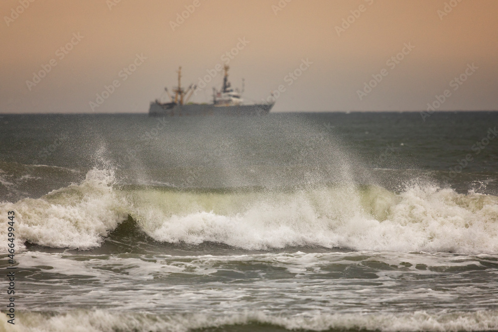 Fishing boat during a storm on the ocean