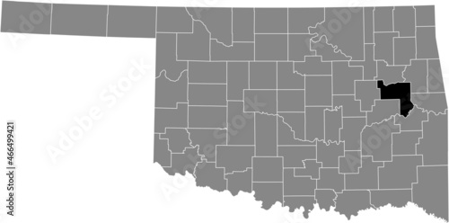 Black highlighted location map of the Muskogee County inside gray administrative map of the Federal State of Oklahoma, USA