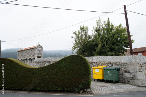 Rural image with stone construction that contrasts with typically urban elements photo