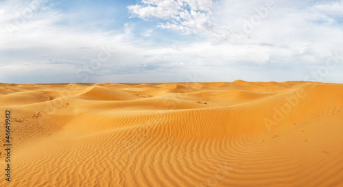 Sandy desert and blue sky