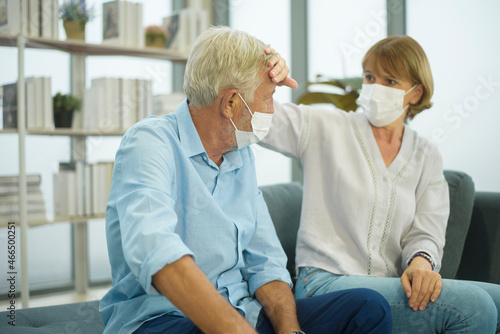 Caucasian senior couple wearing a mask  covid19 pandemic concept
