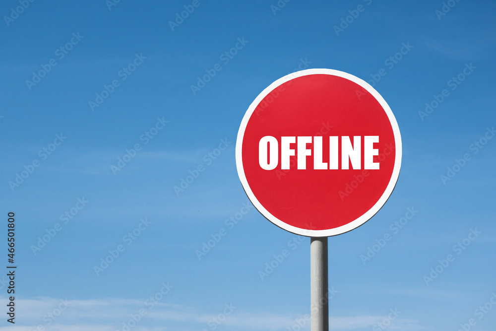 'Offline' sign in a round blue frame against a blue sky