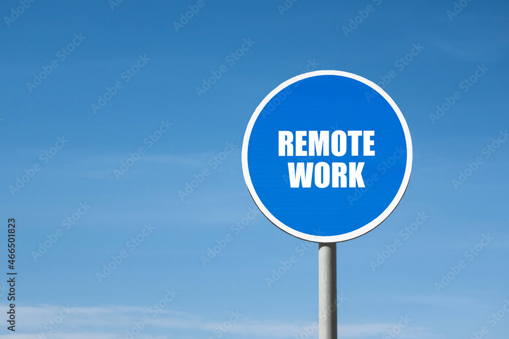 'Remote work' sign in blue round frame on sky background