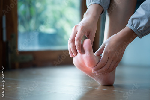 Wallpaper Mural Women touch her foot painful.healthcare and medicine concept. Torontodigital.ca