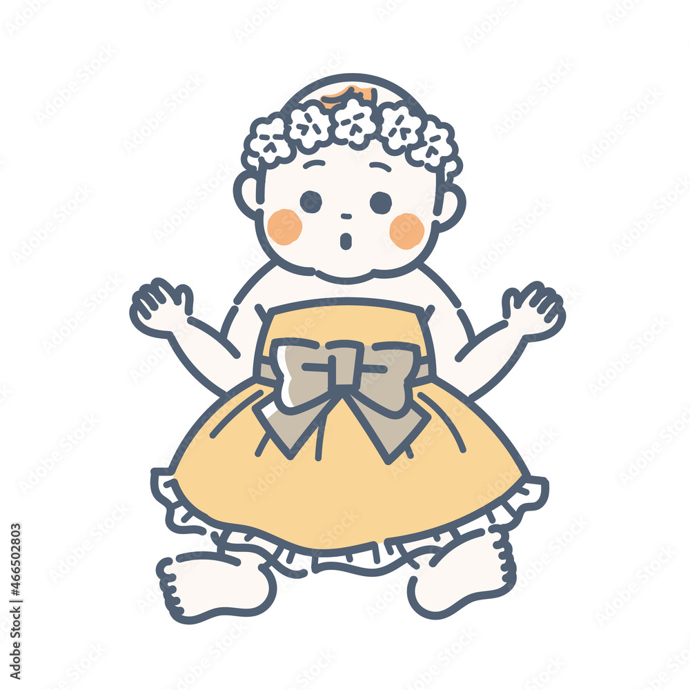ベビードレスを着た赤ちゃん