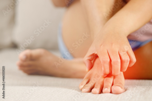 Fungal foot itching caused by biting feet © methaphum