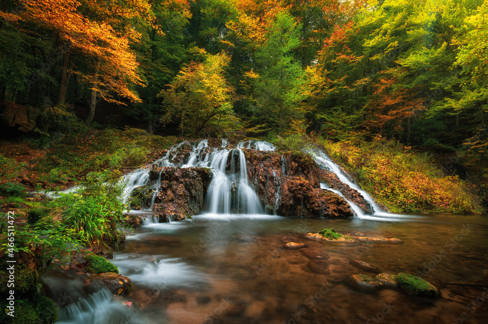 Beautiful waterfall Dokuzak in Strandzha Mountain, Bulgaria at autumn. Waterfall in the forest. Green forest landscape near Bourgas Beautiful waterfall Dokuzak in Strandzha Mountain, Bulgaria at autumn. Waterfall in the forest. Green forest landscape near Bourgas